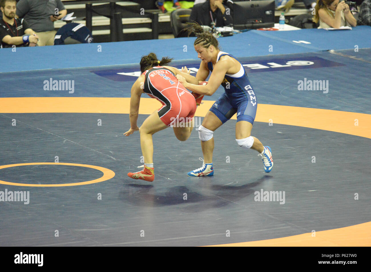 Sgt. Sharon Jacobson (blue) pulls Jessica Medina off the mat duing 53