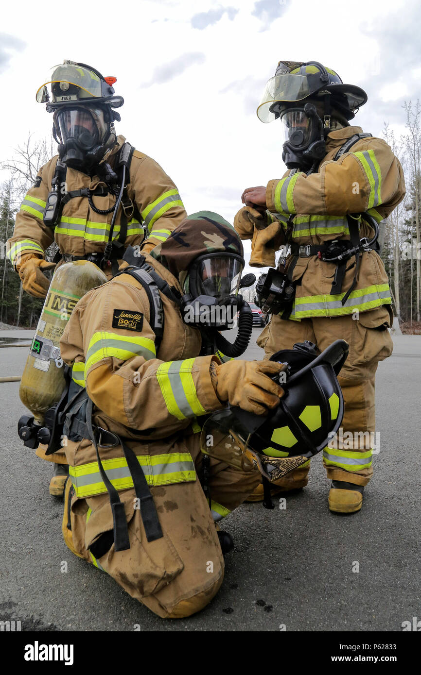 U.S. Air Force fire protection specialists, assigned to the 673rd Civil