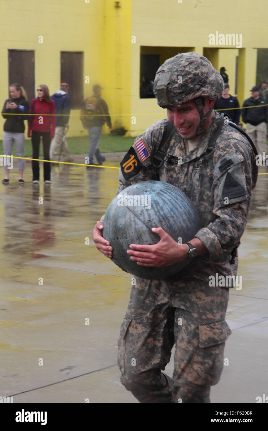 A U.S. Army Ranger from the 1st Armored Division carries an Atlas ball ...