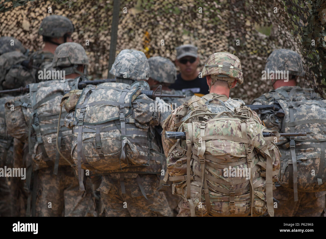 U.S. Army Rangers listen to a range brief before the next event during ...