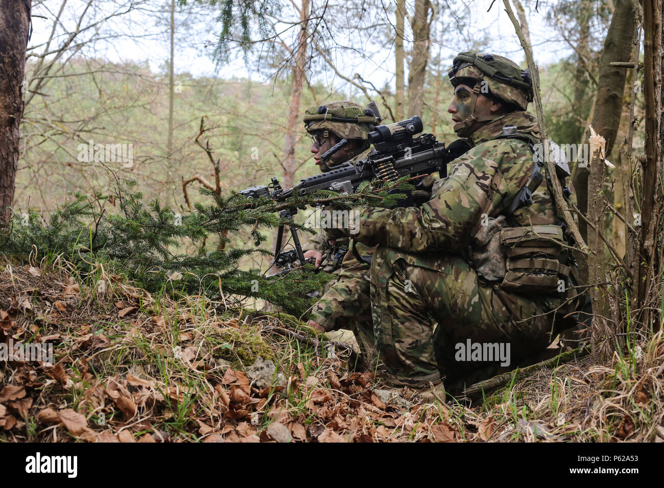 U.S. Soldiers of Able Company, 2nd Battalion, 503rd Infantry Regiment, 173rd Airborne Brigade scan their sector of fire during a counter reconnaissance offensive operational scenario during exercise Saber Junction 16 at the U.S. Army’s Joint Multinational Readiness Center (JMRC) in Hohenfels, Germany, April 14, 2016. Saber Junction 16 is the U.S. Army Europe’s 173rd Airborne Brigade’s combat training center certification exercise, taking place at the JMRC in Hohenfels, Germany, Mar. 31-Apr. 24, 2016.  The exercise is designed to evaluate the readiness of the Army’s Europe-based combat brigades Stock Photo