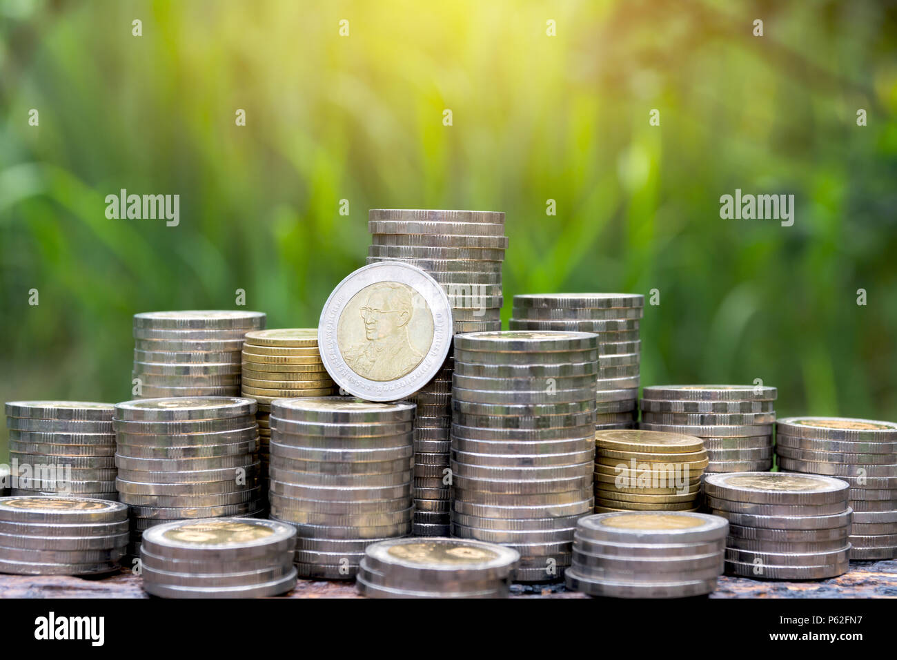 Saving money concept with money coin stack growing for business ...