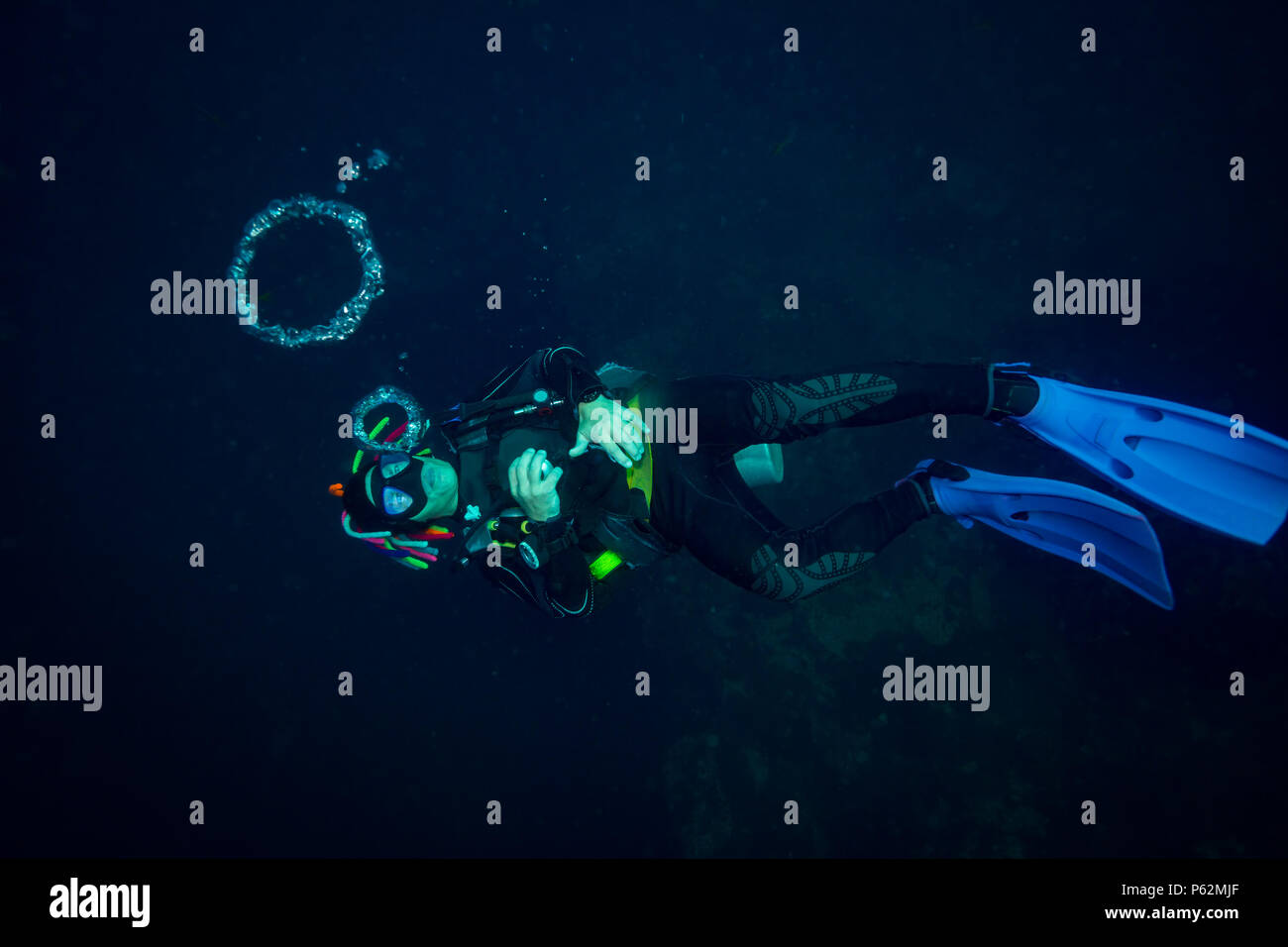 The scuba diver blows the air rings Stock Photo Alamy