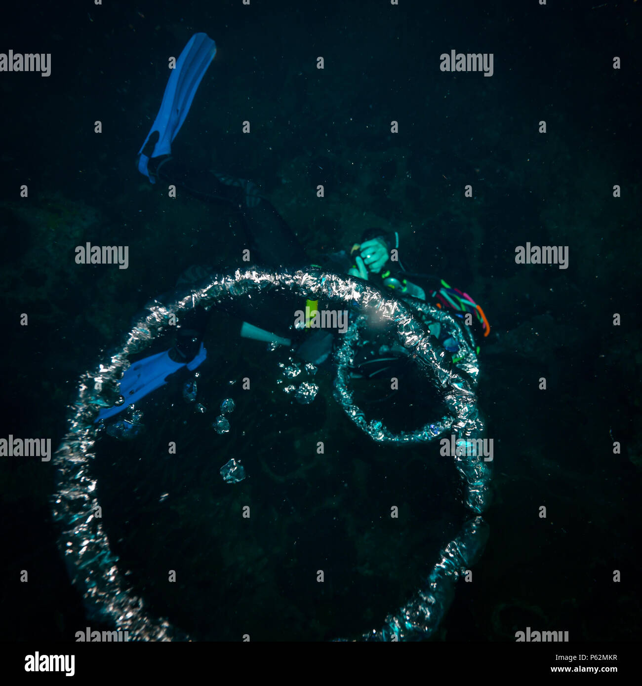The scuba diver blows the air rings Stock Photo Alamy