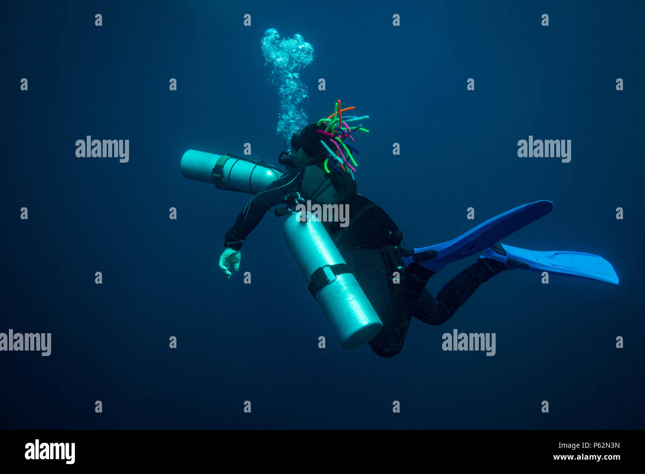 Scubadiver in a sidemount configuration of equipment Stock Photo Alamy