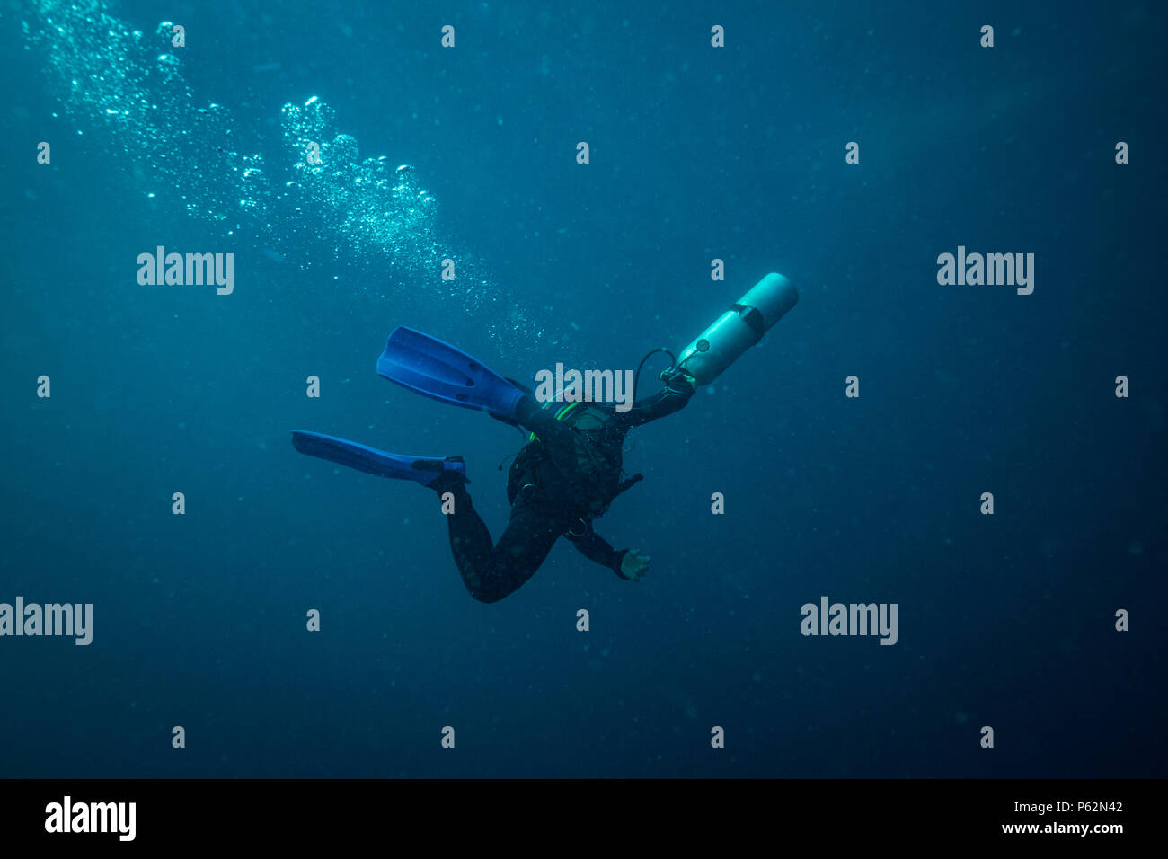 Scubadiver in a sidemount configuration of equipment Stock Photo - Alamy