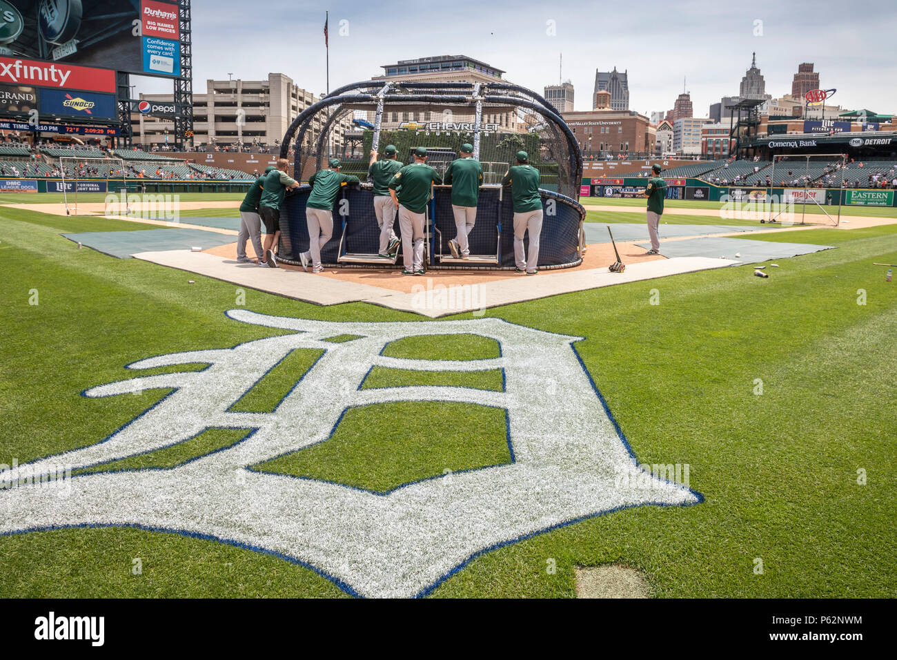 Detroit, Michigan - Members of the Oakland Athletics watch batting practice at Comerica Park before a baseball game against the Detroit Tigers. Stock Photo