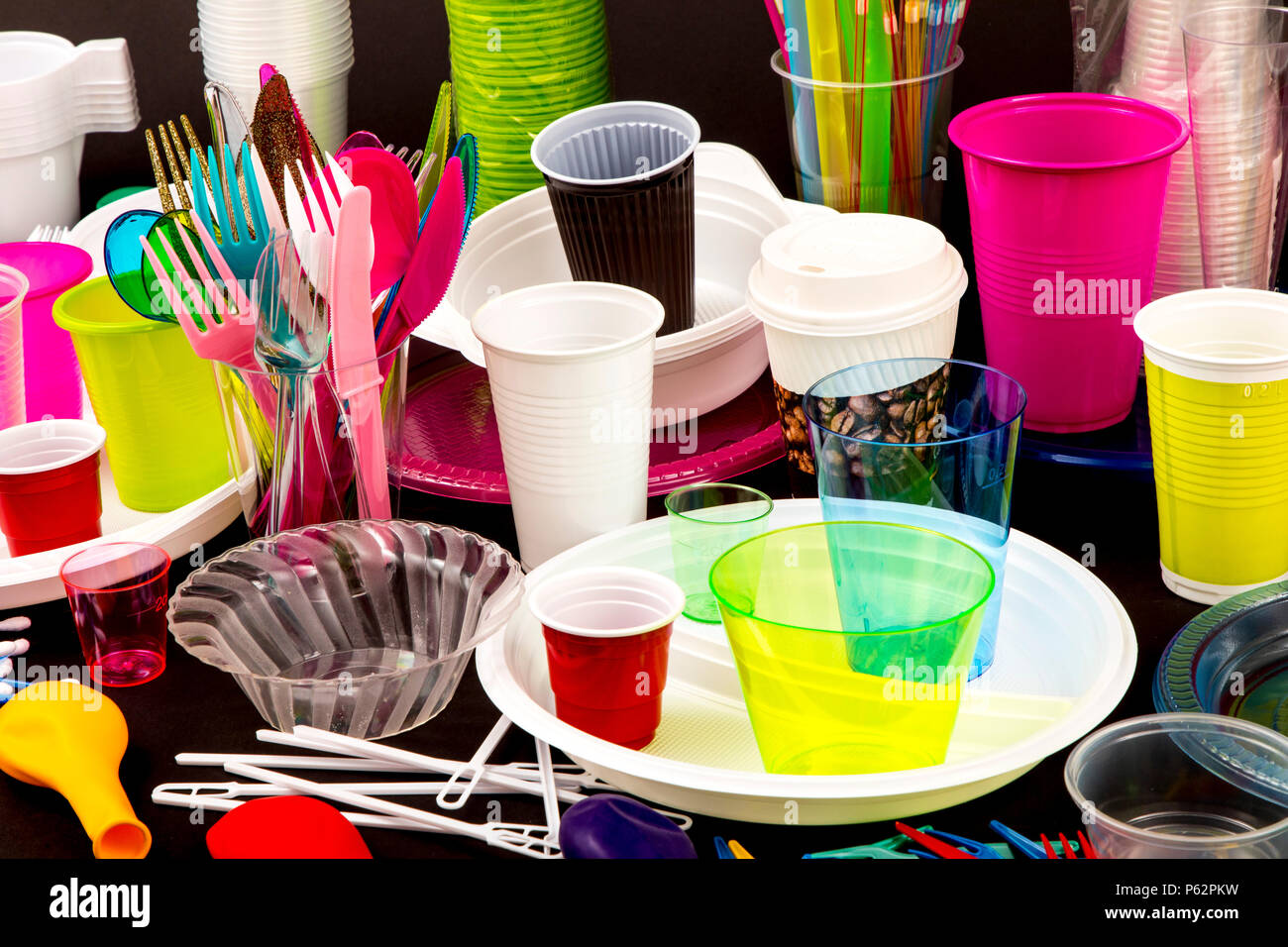https://c8.alamy.com/comp/P62PKW/disposable-tableware-plastic-utensils-plastic-cups-cutlery-and-other-plastic-products-plastic-waste-various-colors-sizes-and-types-P62PKW.jpg