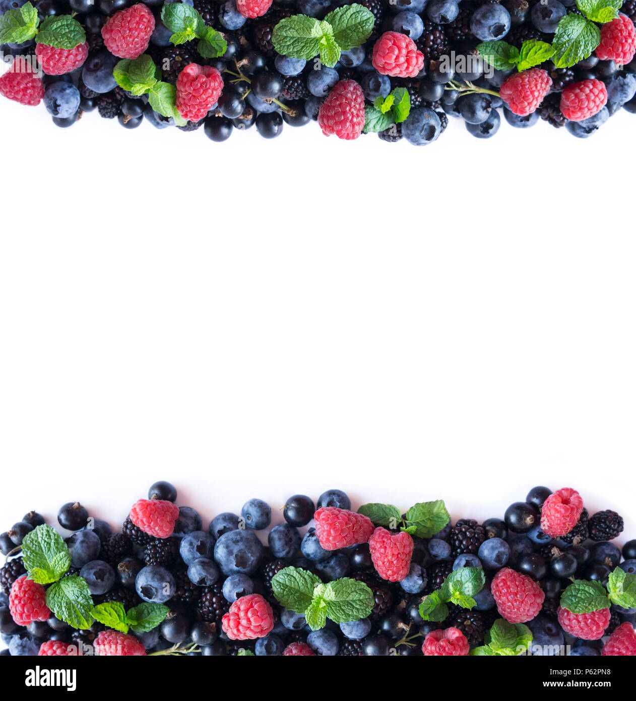 Mix berries and fruits at border of image with copy space for text