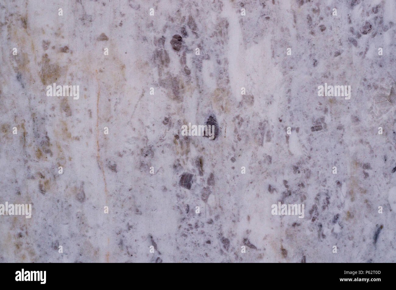 gray marble granite with dark spots background. texture. Stock Photo