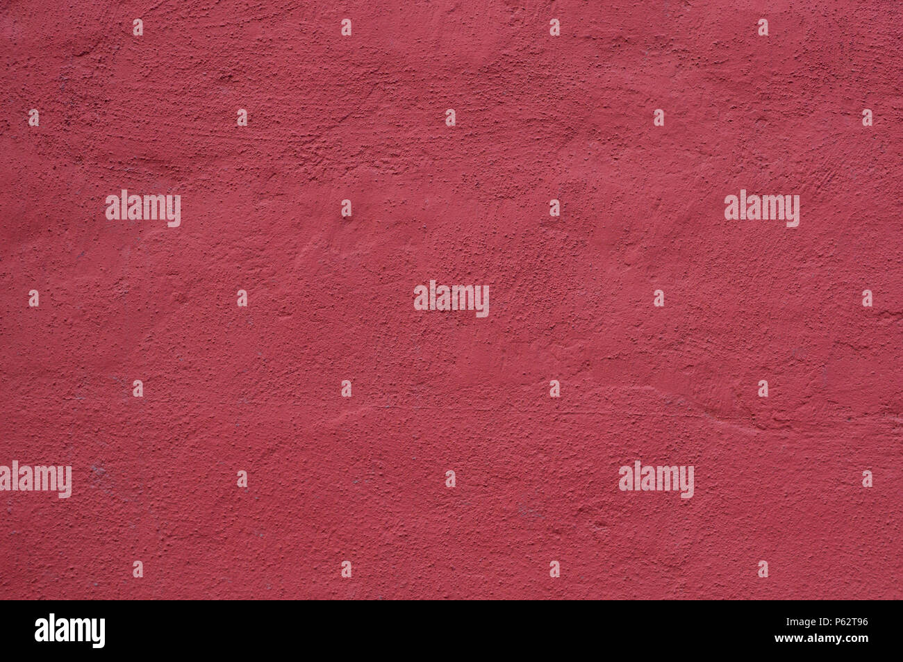 cemented wall painted red background. texture. Stock Photo