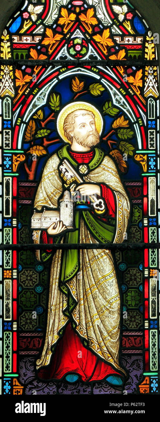 St. Peter, stained glass window, by Frederick Preedy 1863, holding model of Ringstead church, Ringstead, Norfolk, UK Stock Photo