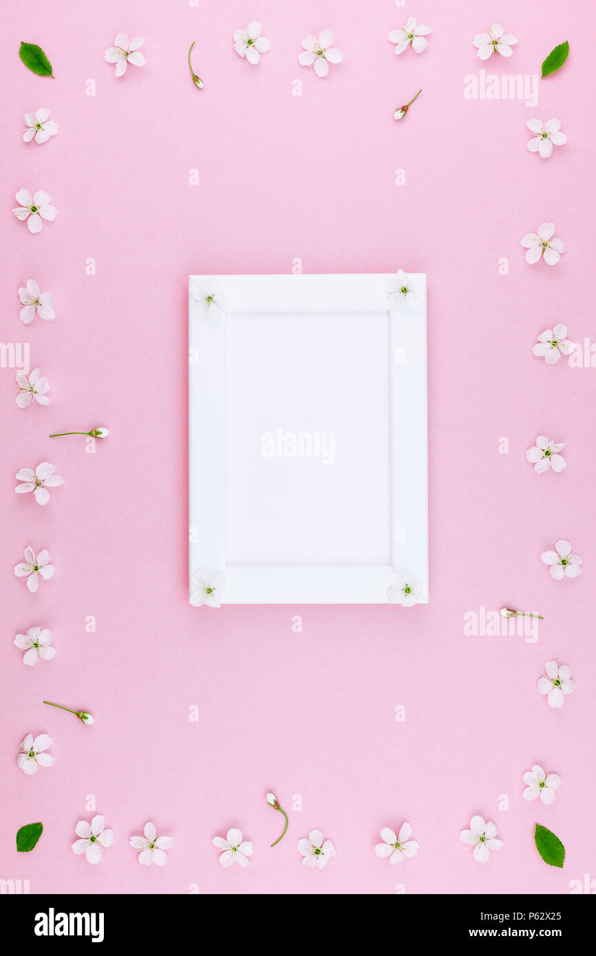 Creative flat lay concept top view of blank frame mock up and cherry ...