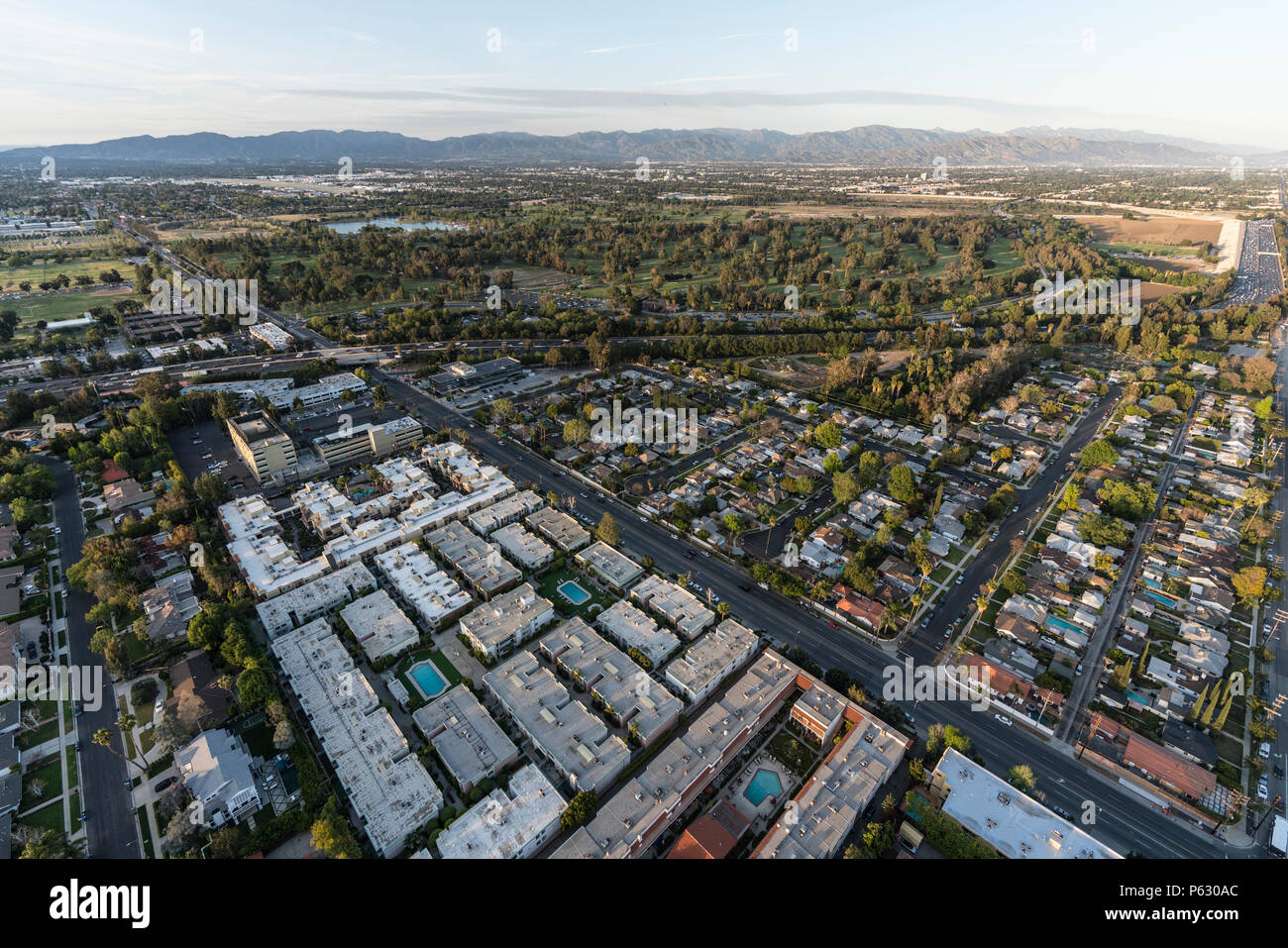 Afternoon aerial view towards the Sepulveda basin in the Encino area of the San Fernando Valley in Los Angeles, California. Stock Photo