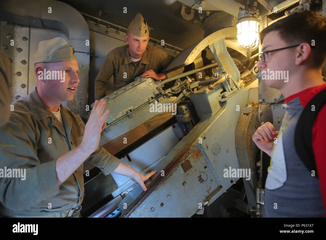 Marines with 2nd Tank Battalion explain the various duties of the 13