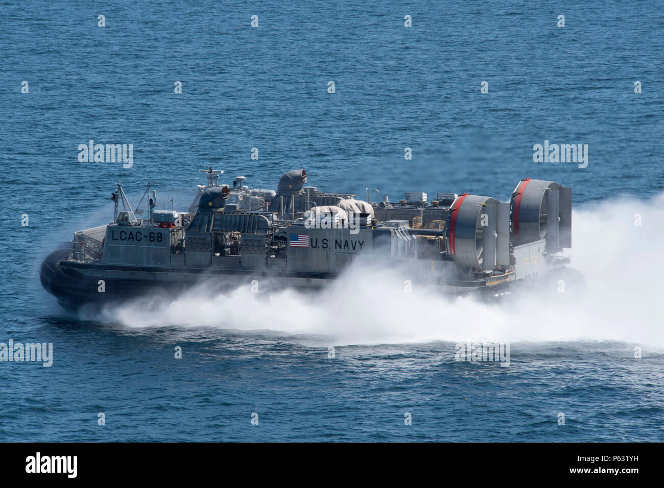 160411-N-VK310-022 ATLANTIC OCEAN (April 11, 2016) An air cushion landing craft  (LCAC) operates with the amphibious assault ship USS Wasp (LHD 1).  Wasp is underway with the Wasp Amphibious Ready Group participating in Amphibious Ready Group/Marine Expeditionary Unit Exercise. (U.S. Navy photo by Mass Communication Specialist Seaman Michael Molina/Released) Stock Photo