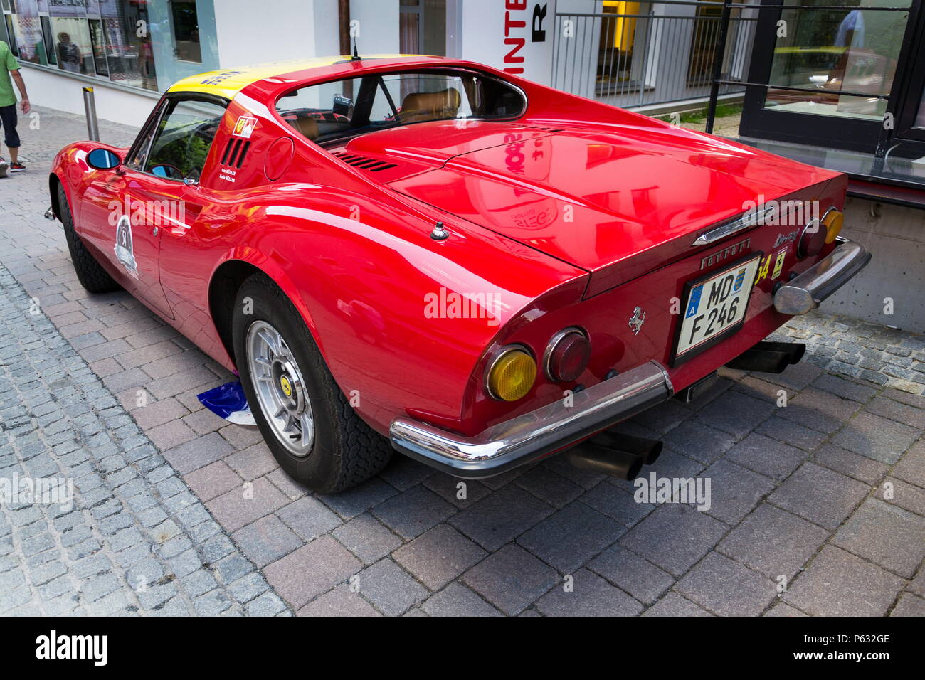 SAALBACH-HINTERGLEMM, AUSTRIA - JUNE 21 2018: Ferrari Dino oldsmobile vintage veteran cars preparing for Saalbach Classic rally on June 21, 2018 Stock Photo