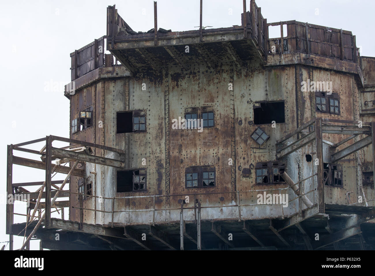 Maunsell Forts - Red Sands sea forts now abandoned, Close up of the disrepair showing rust and damaged windows Stock Photo