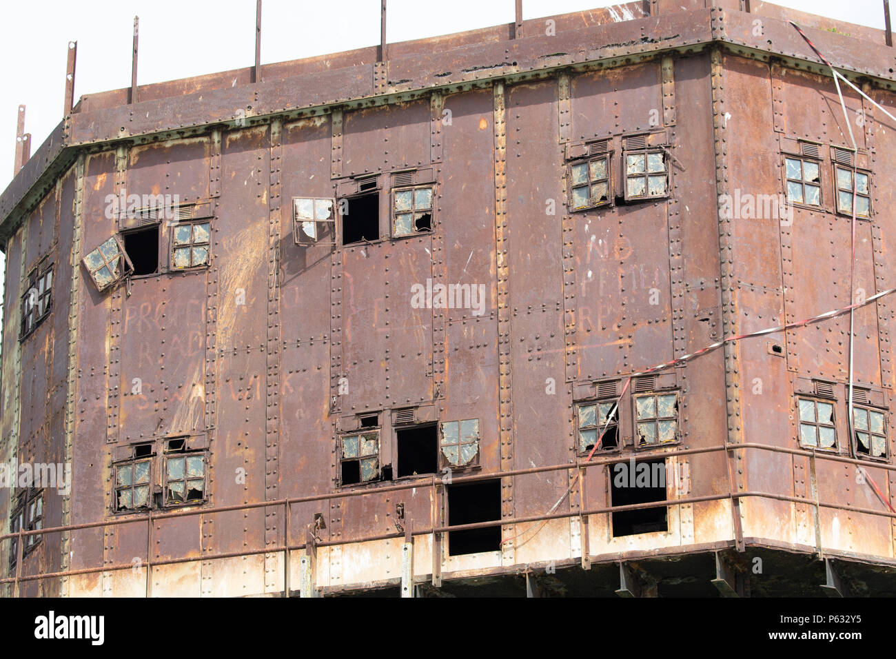 Maunsell Forts - Red Sands sea forts now abandoned, Close up of the disrepair showing rust and damaged windows Stock Photo
