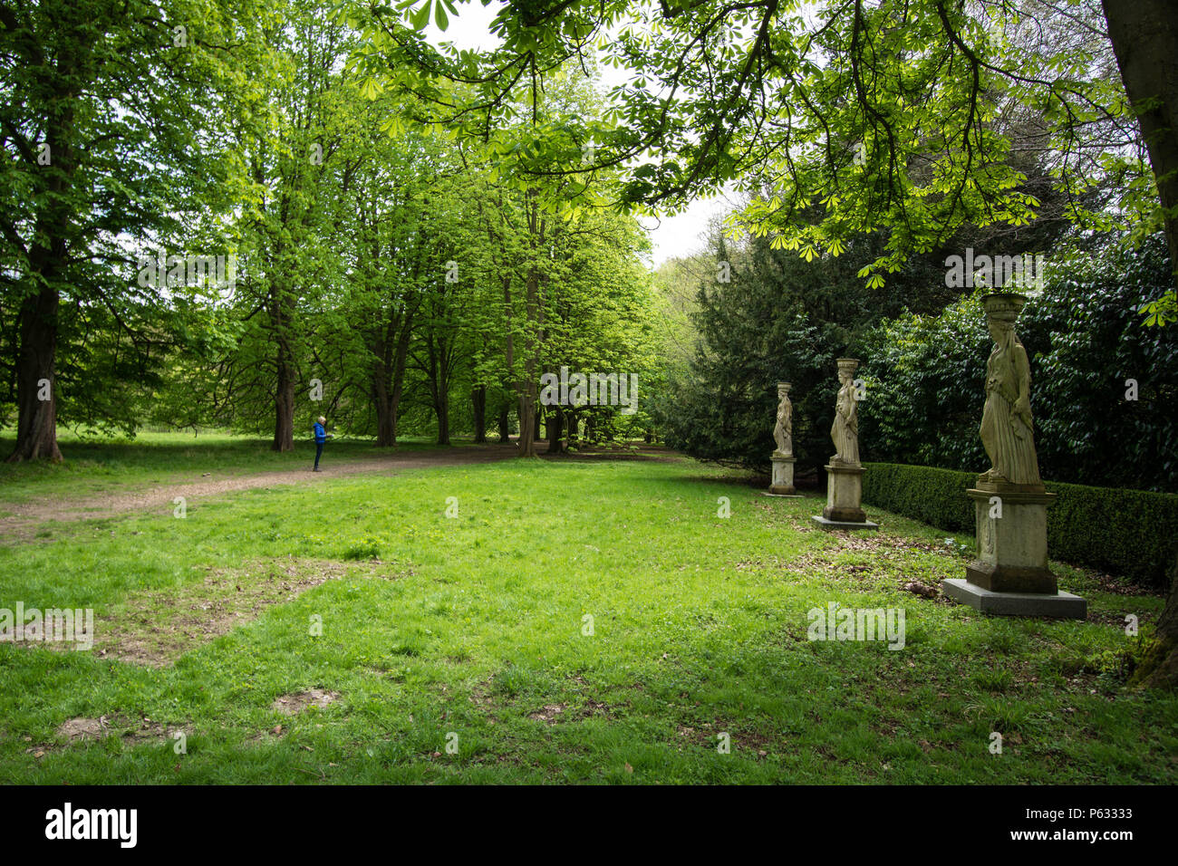Greek statues in a Stately Home Garden UK Stock Photo Alamy