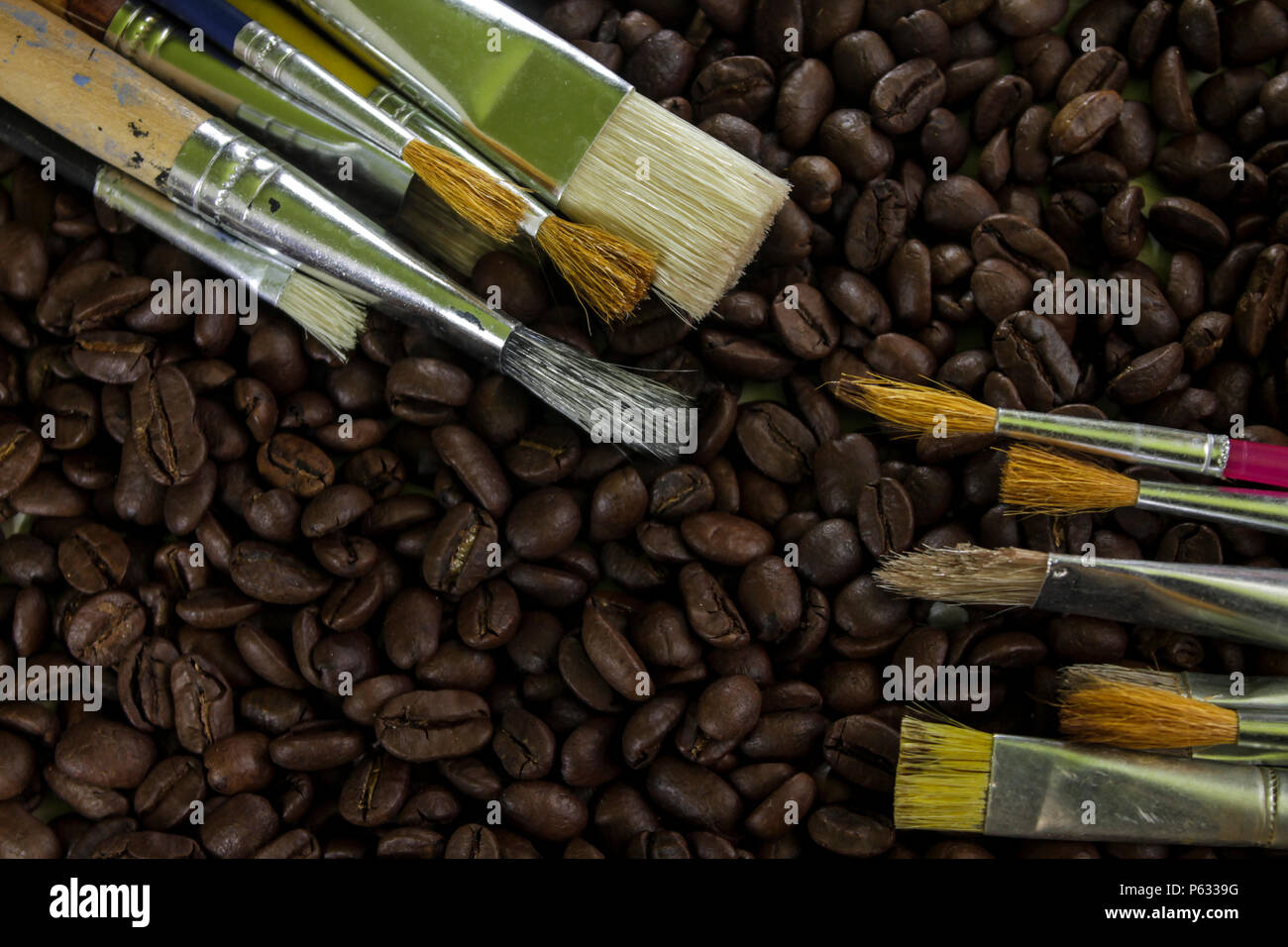 Coffee beans, artist paint brushes, art, painting Stock Photo Alamy