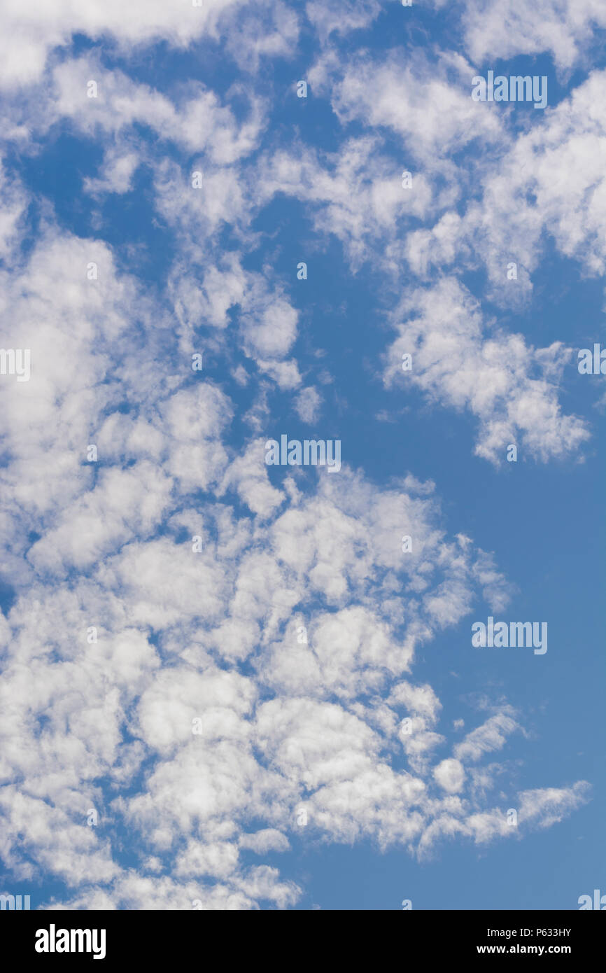 Blue summer sky with fluffy white clouds. Blue sky thinking Stock Photo ...