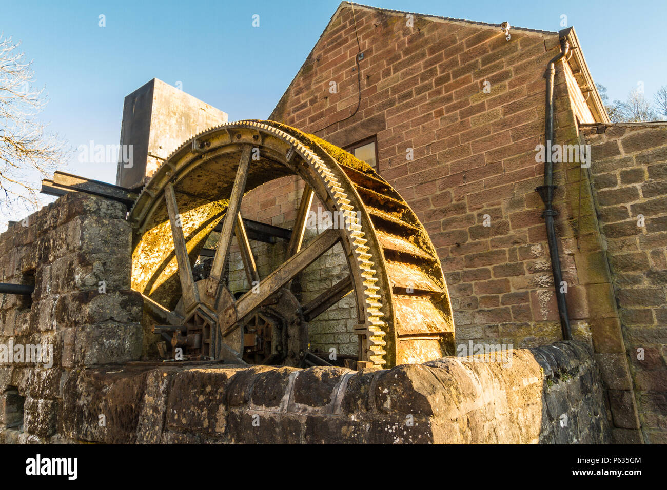 Vintage overshot water wheel. Cromford, Derbyshire, England, UK Stock