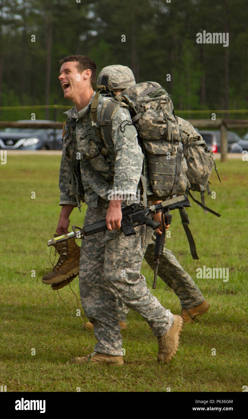 Rangers assigned to the 75th Ranger Regiment move between obstacles ...
