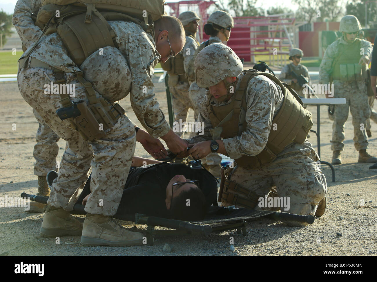 A U.S. Marine with Headquarters and Headquarters Sqaudron acts as a non ...