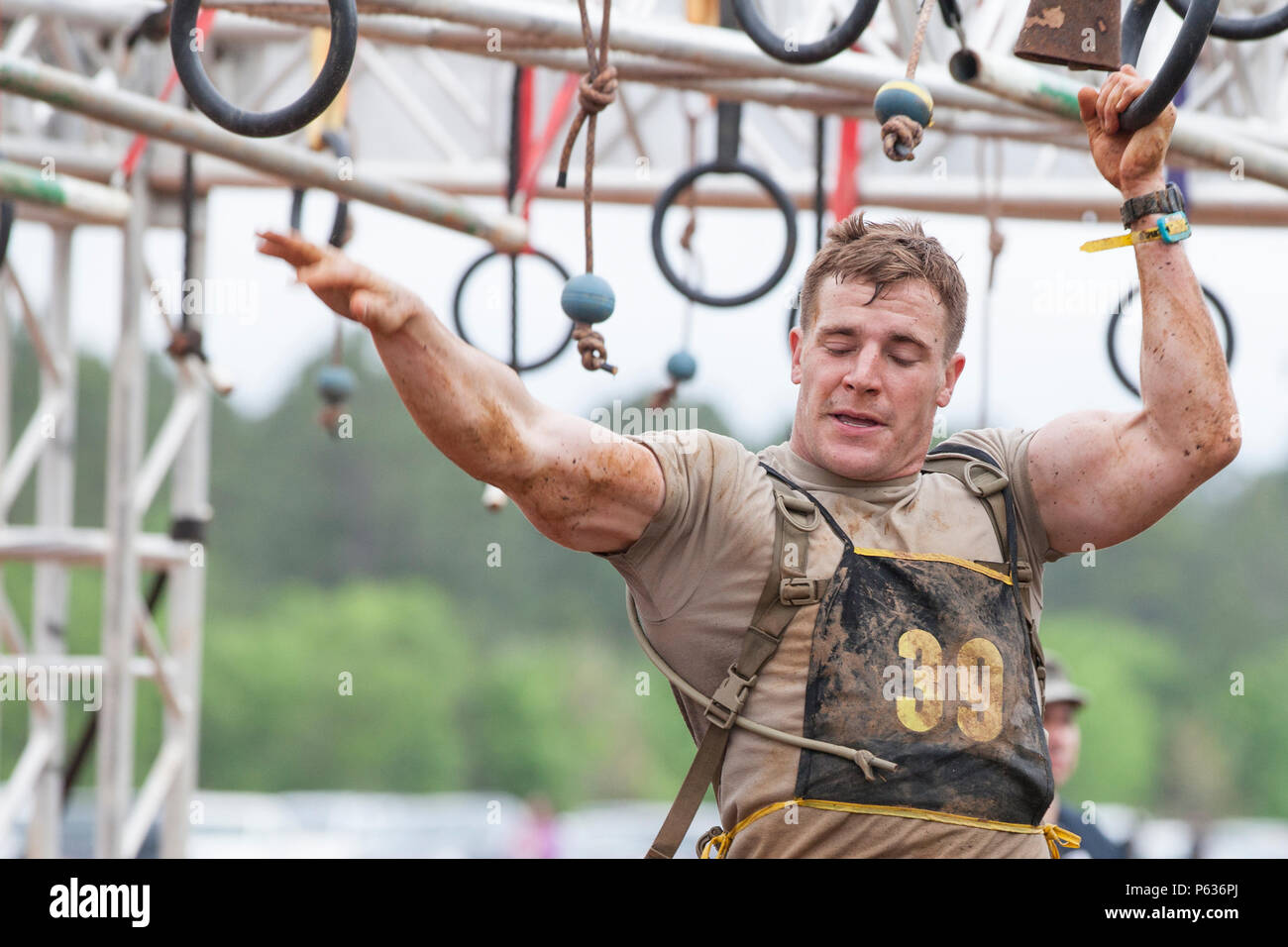 U.S. Army Sgt. Steven Strickland, 75th Ranger Regiment, navigates through  an obstacle course during a Spartan Race in support of Best Ranger  Competition 2016, Fort Mitchell, Ala., April 16, 2016. The 33rd