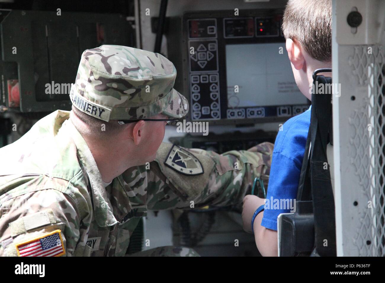U.S. Army Pfc. John Flannery, Delta Company 1-16, 316th Cavalry Bridgade, demonstrates control functions of the Stryker infantry carrier vehicle during the Thunder in the Valley Air Show at Columbus Airport, Columbus, Ga., April 16, 2016. The Thunder in the Valley Air Show began in 1997 and has grown to become one the largest outdoor family events in the Chattahoochee Valley. The air show brings in top performers from across the United States. (U.S. Army photo by Spc. Zakia Gray /Released) Stock Photo