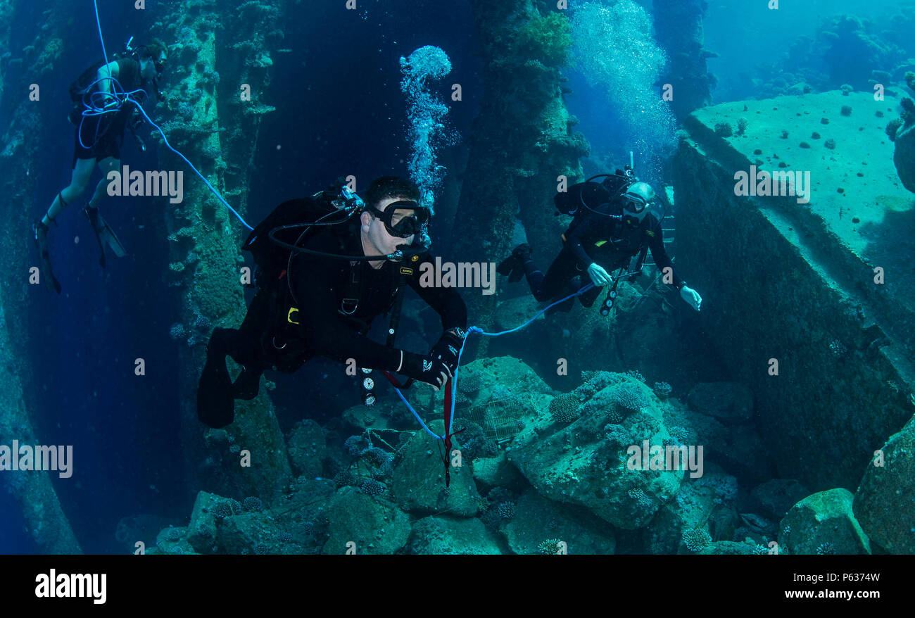 Task Force 56 Members of Commander, Task Force 56 conduct detailed pier inspections ...