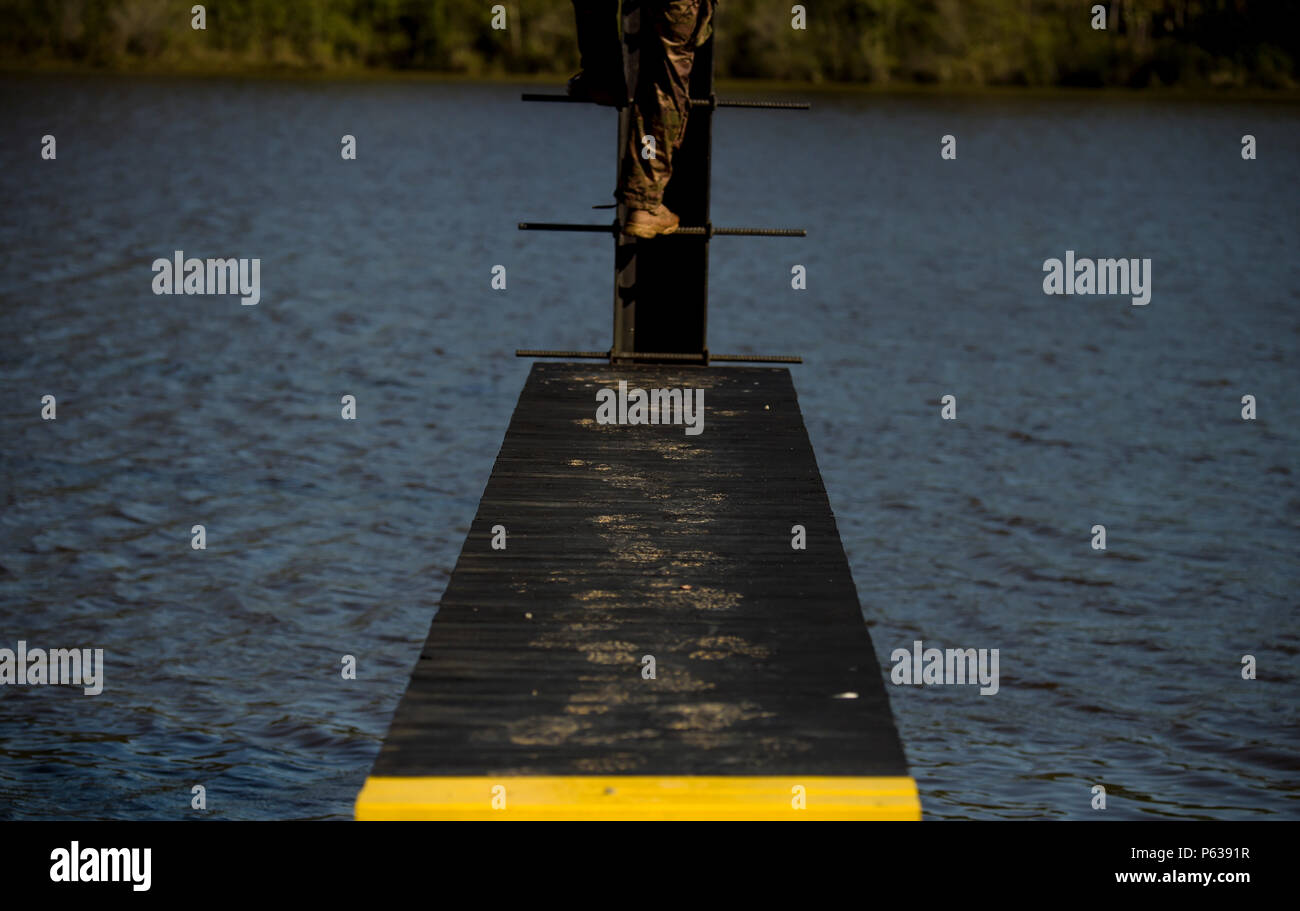 Army Ranger Ladder Man A U.S. Army officer climbs a vertical ladder during the Best Ranger ...