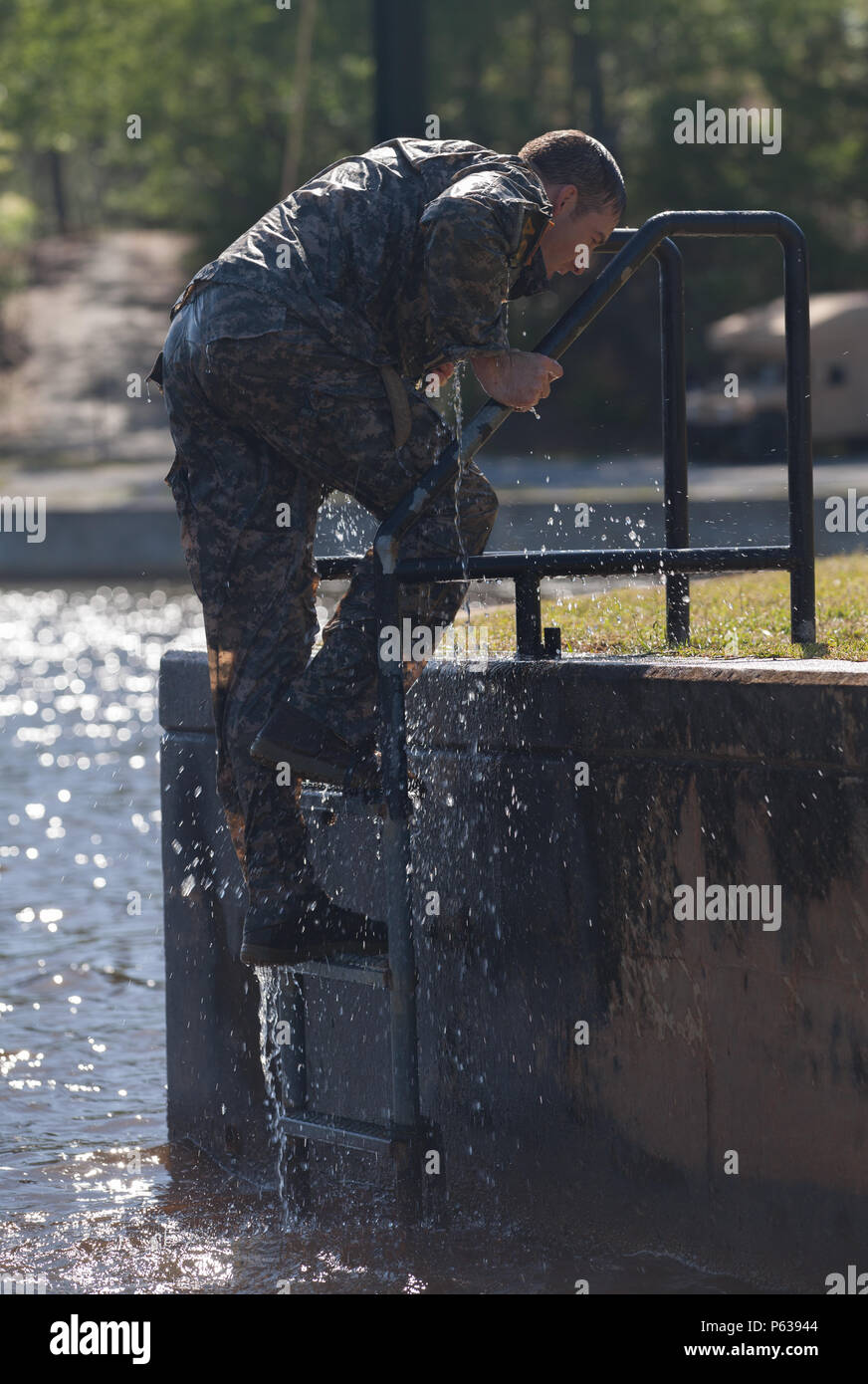 Army Ranger Ladder Man A U.S. Army Ranger assigned to the 7th Special Forces Group climbs a ...
