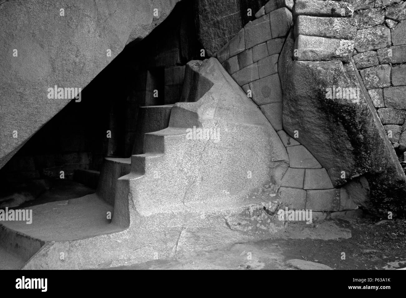 The ROYAL TOMB is found under the TEMPLE OF THE SUN  - INCA RUINS of MACHU PICCHU, PERUVIAN ANDES Stock Photo