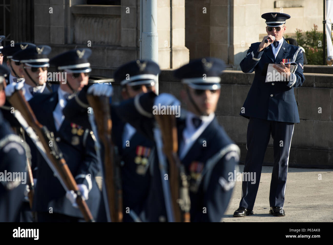 Approximately 15 members of the U.S. Air Force Honor Guard Drill Team perform at the Sunken Garden Theater in San Antonio, Texas, at the Taste of New Orleans event, held during the Fiesta San Antonio celebration, April 15, 2016. The Drill Team participated in Fiesta San Antonio events around the Alamo City April 12-19. (U.S. Army National Guard photo by Sgt. Zachary Sheely/Released) Stock Photo