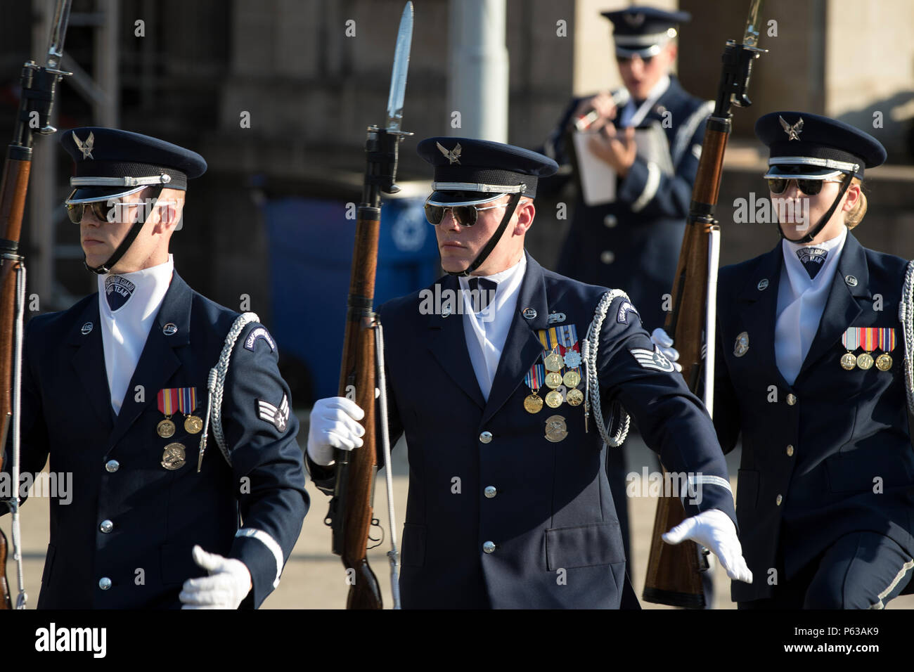 Approximately 15 members of the U.S. Air Force Honor Guard Drill Team perform at the Sunken Garden Theater in San Antonio, Texas, at the Taste of New Orleans event, held during the Fiesta San Antonio celebration, April 15, 2016. The Drill Team participated in Fiesta San Antonio events around the Alamo City April 12-19. (U.S. Army National Guard photo by Sgt. Zachary Sheely/Released) Stock Photo