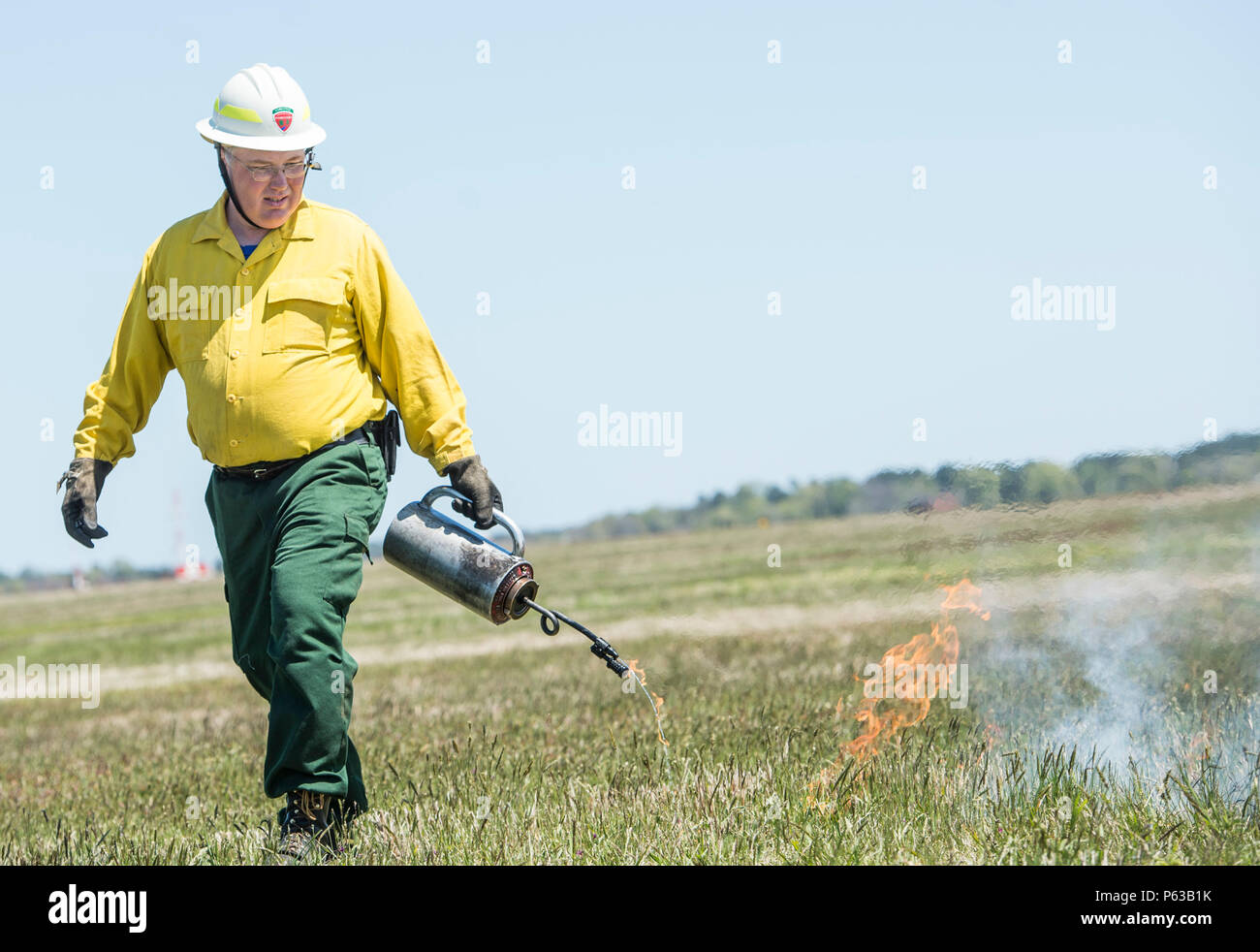 As part of a controlled burn, a member of the Virginia Department of