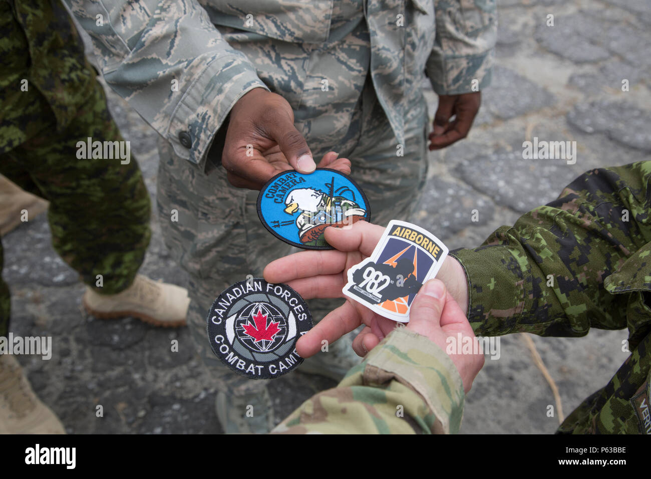 Members of the Canadian Armed Forces, U.S. Air Force, and Members of the Canadian Armed Forces, U.S. Air Force, and