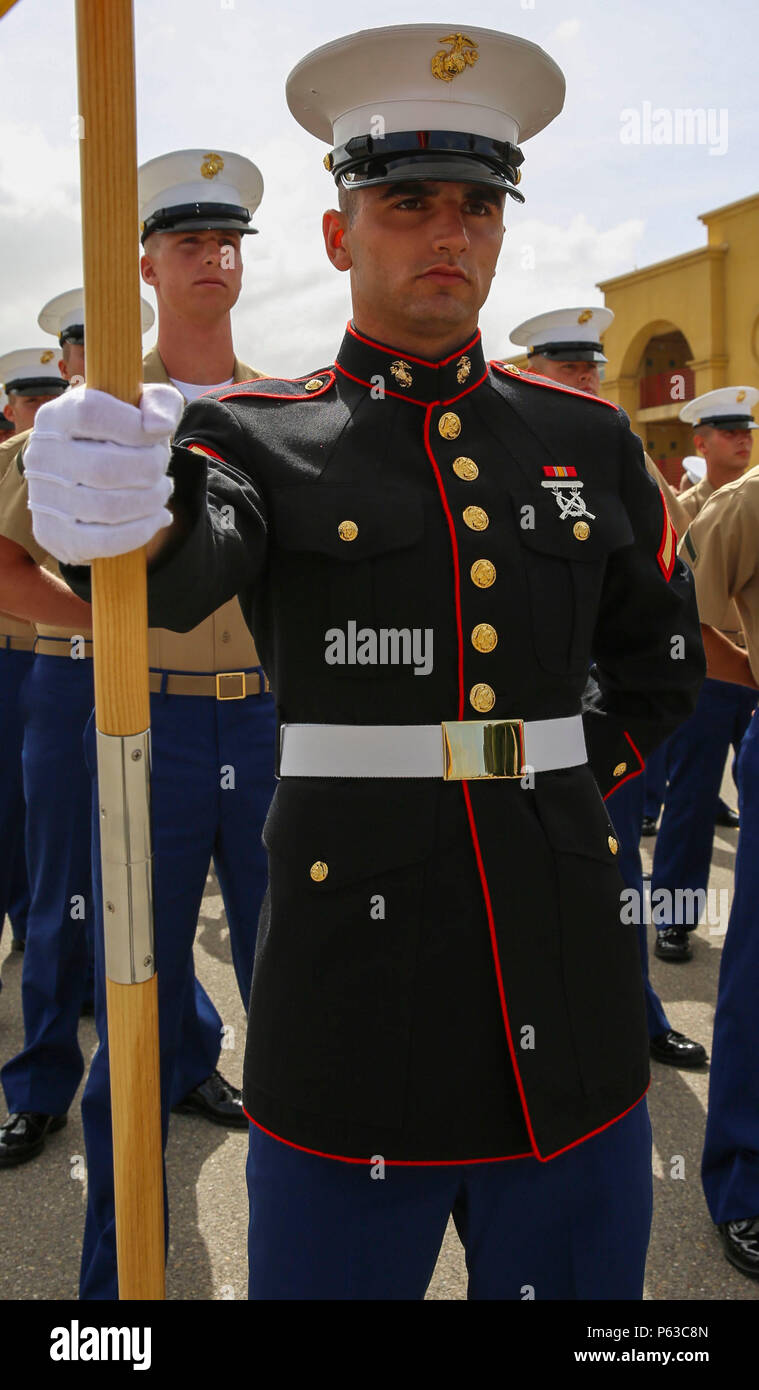 Private First Class Cole M. Melloch, Platoon 3273, Mike Company, 3rd Recruit Training Battalion, stands at parade rest prior to graduation at Marine Corps Recruit Depot San Diego, April 15. Melloch is a San Ramon, Calif., native and was recruited out of Recruiting Station San Jose. Annually, more than 17,000 males recruited from the Western Recruiting Region are trained at MCRD San Diego. Stock Photo