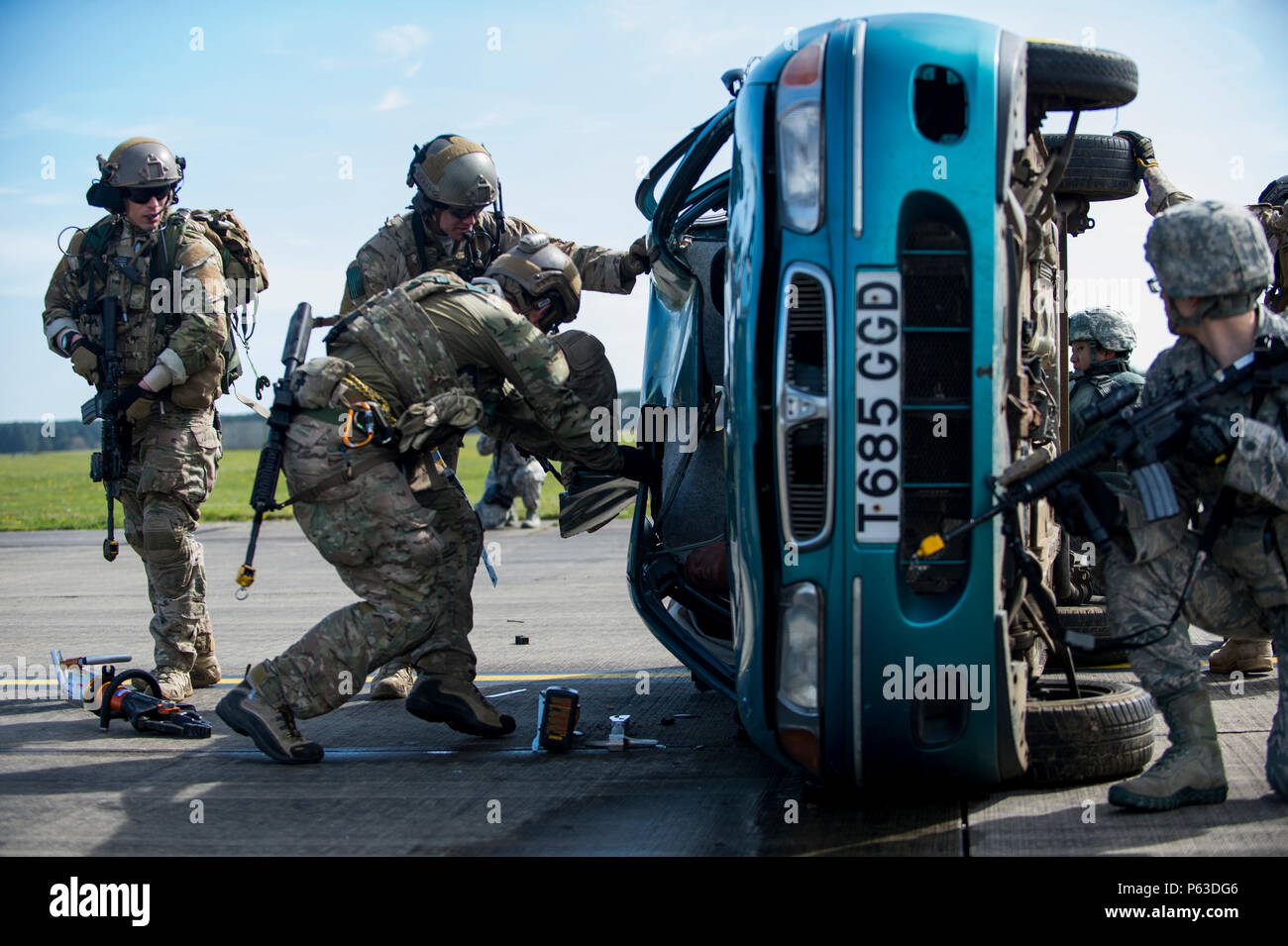 Force Test Rescue Pararescuemen from the 57th Rescue Squadron employ rescue cutting tools ...