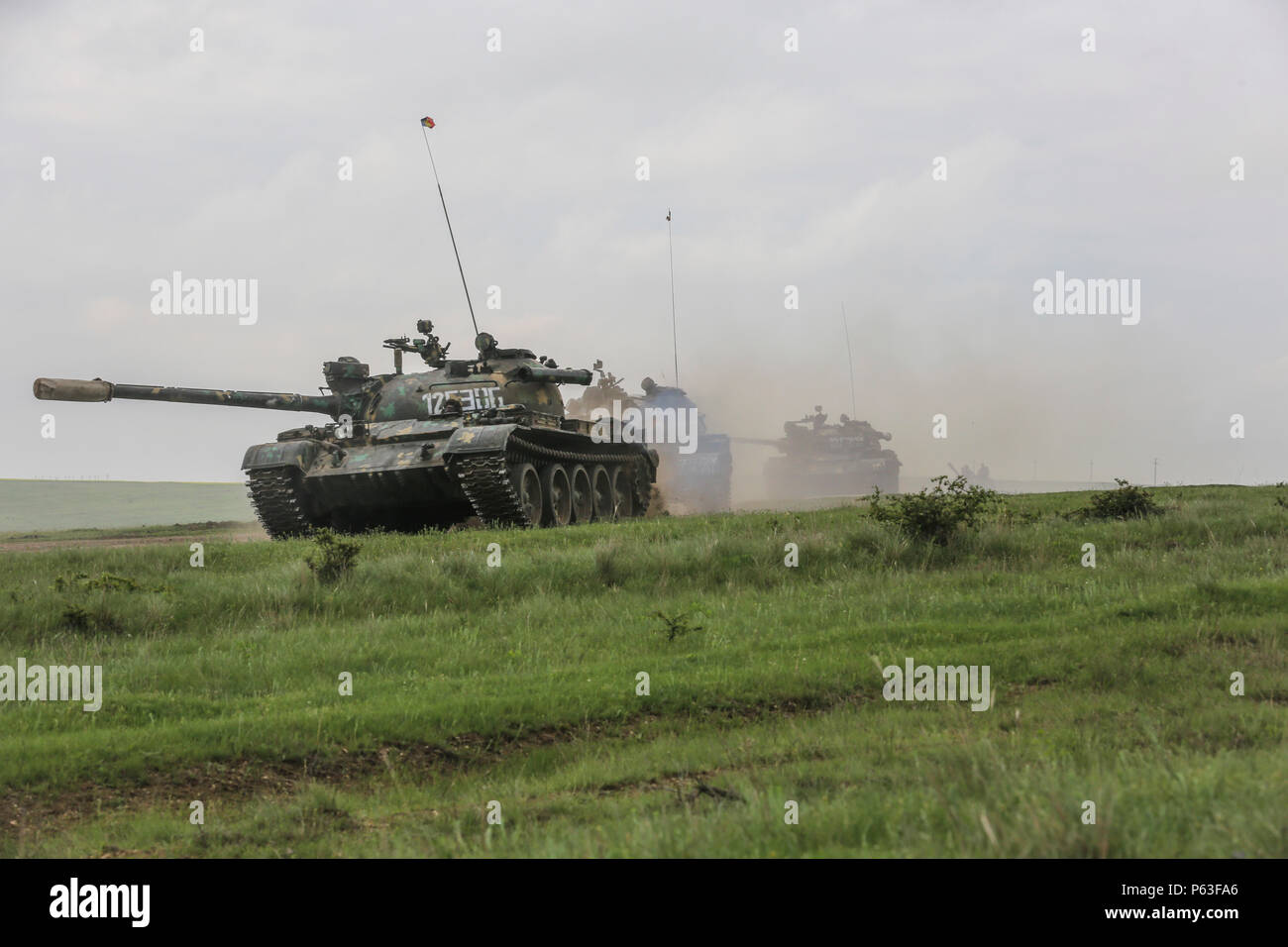 Romanian soldiers move their T-55 Tanks to the next objective during a live-fire exercise during Platinum Lynx 16-4 aboard Babadag Training Area, Romania, April 21, 2016. The purpose behind Platinum Lynx is to improve readiness and increase Marines’ ability to work seamlessly with other NATO and partner nations around the world. (U.S. Marine Corps photo by Cpl. Immanuel M. Johnson/Released) Stock Photo