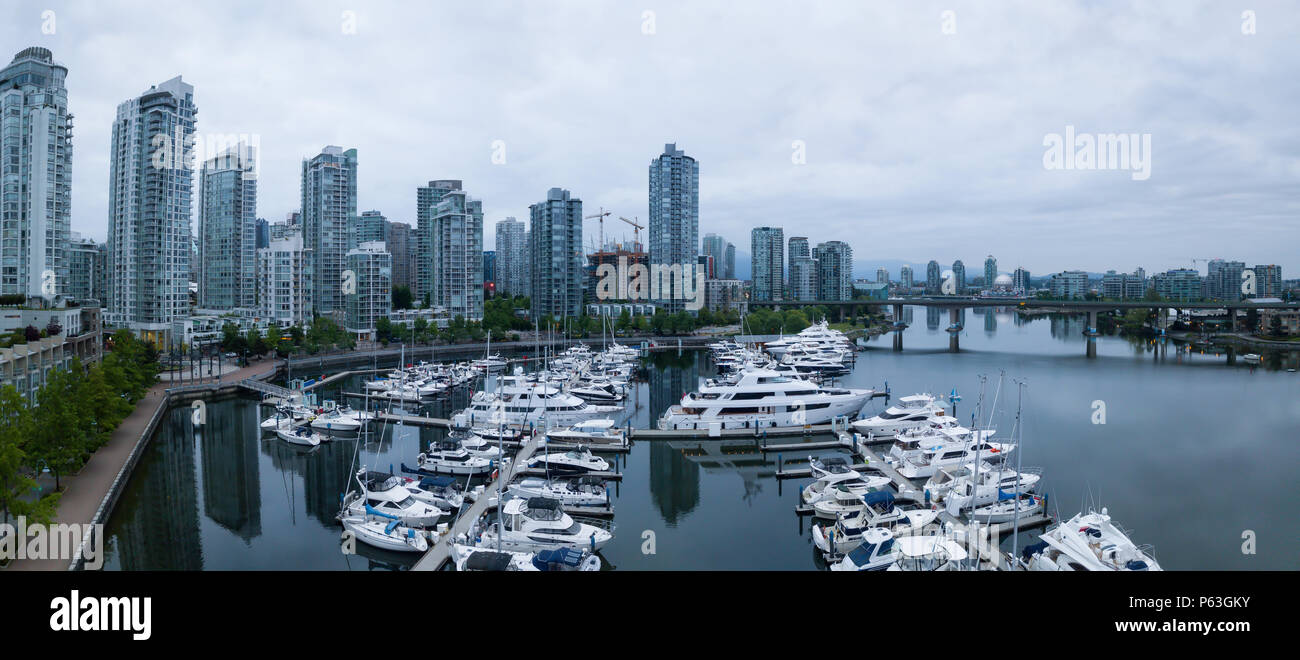 Aerial view of False Creek During a cloudy sunrise. Taken in Downtown ...