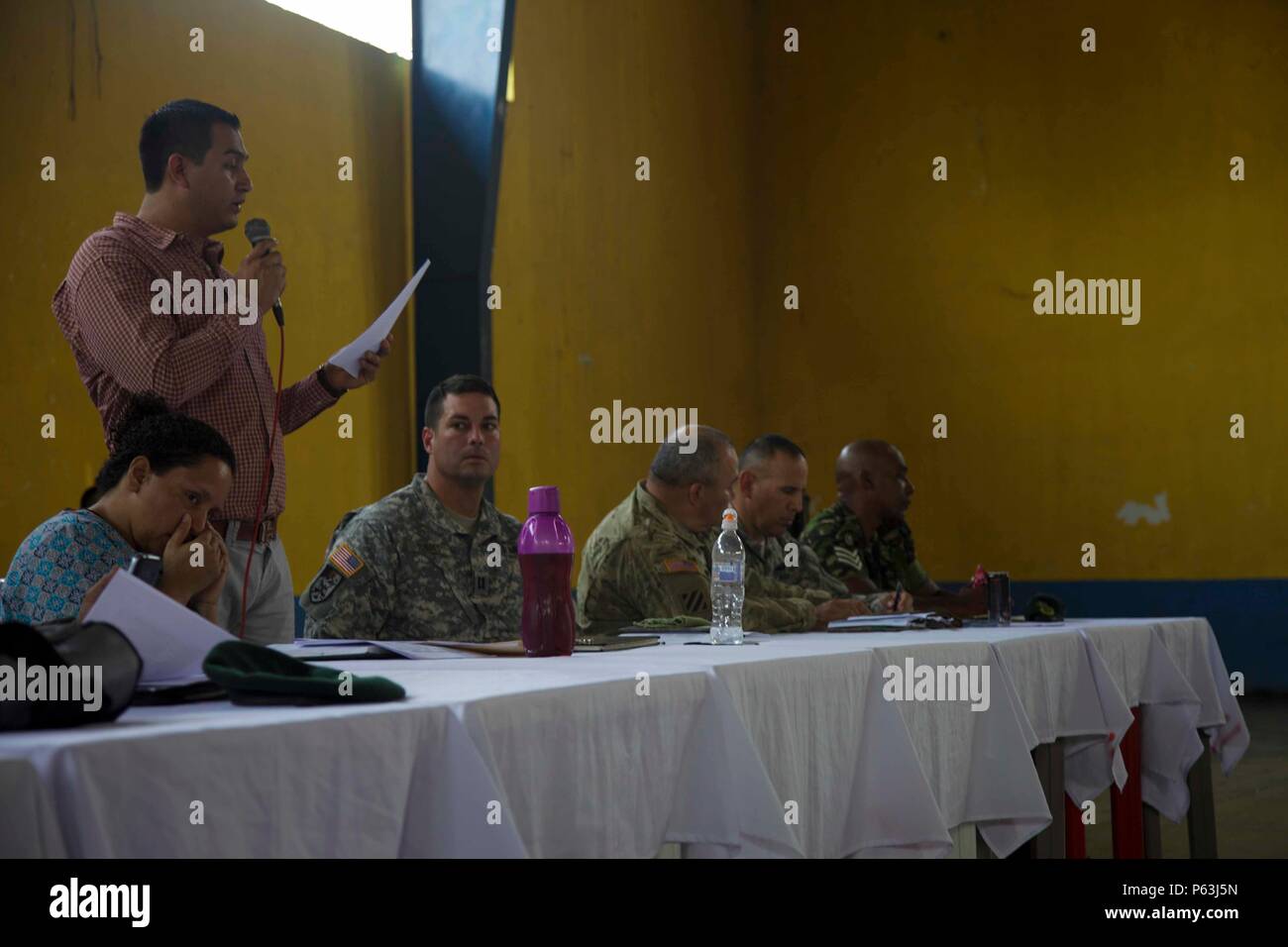 Assistant Mayor Pablo Pocheco speaks to local Cocodes from the surrounding areas about the future Medical Readiness Exercise as part of the  Beyond The Horizon Operation at San Pablo, Guatemala, April 29, 2016. Task Force Red Wolf and Army South conducts Humanitarian Civil Assistance Training to include tactical level construction projects and Medical Readiness Training Exercises providing medical access and building schools in Guatemala with the Guatemalan Government and non-government agencies from 05MAR16 to 18JUN16 in order to improve the mission readiness of US forces and to provide a las Stock Photo