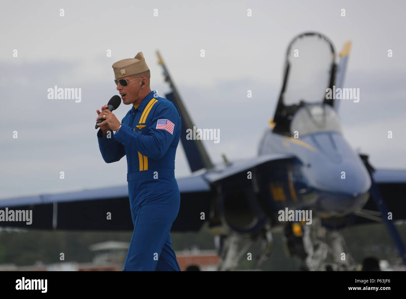 A U.S. Navy Blue Angels pilot and narrator addresses the audience at ...