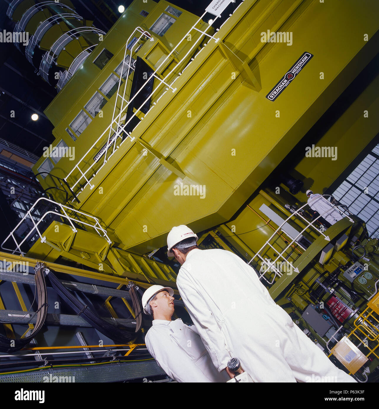 Men working inside power plant Stock Photo - Alamy