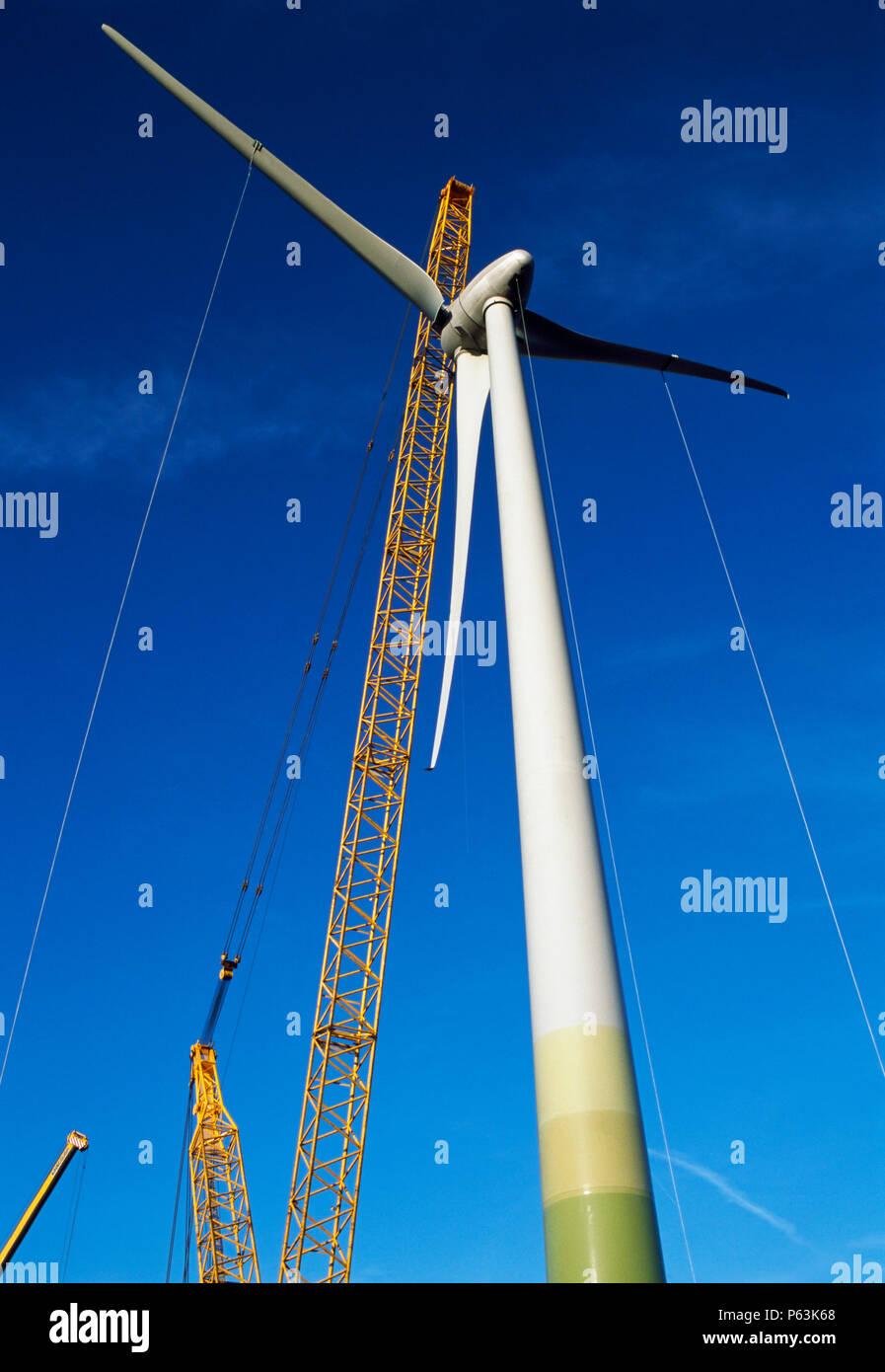 A giant Enercon wind turbine nears completion during its installation. Worksop United Kingdom. December 2008. Stock Photo