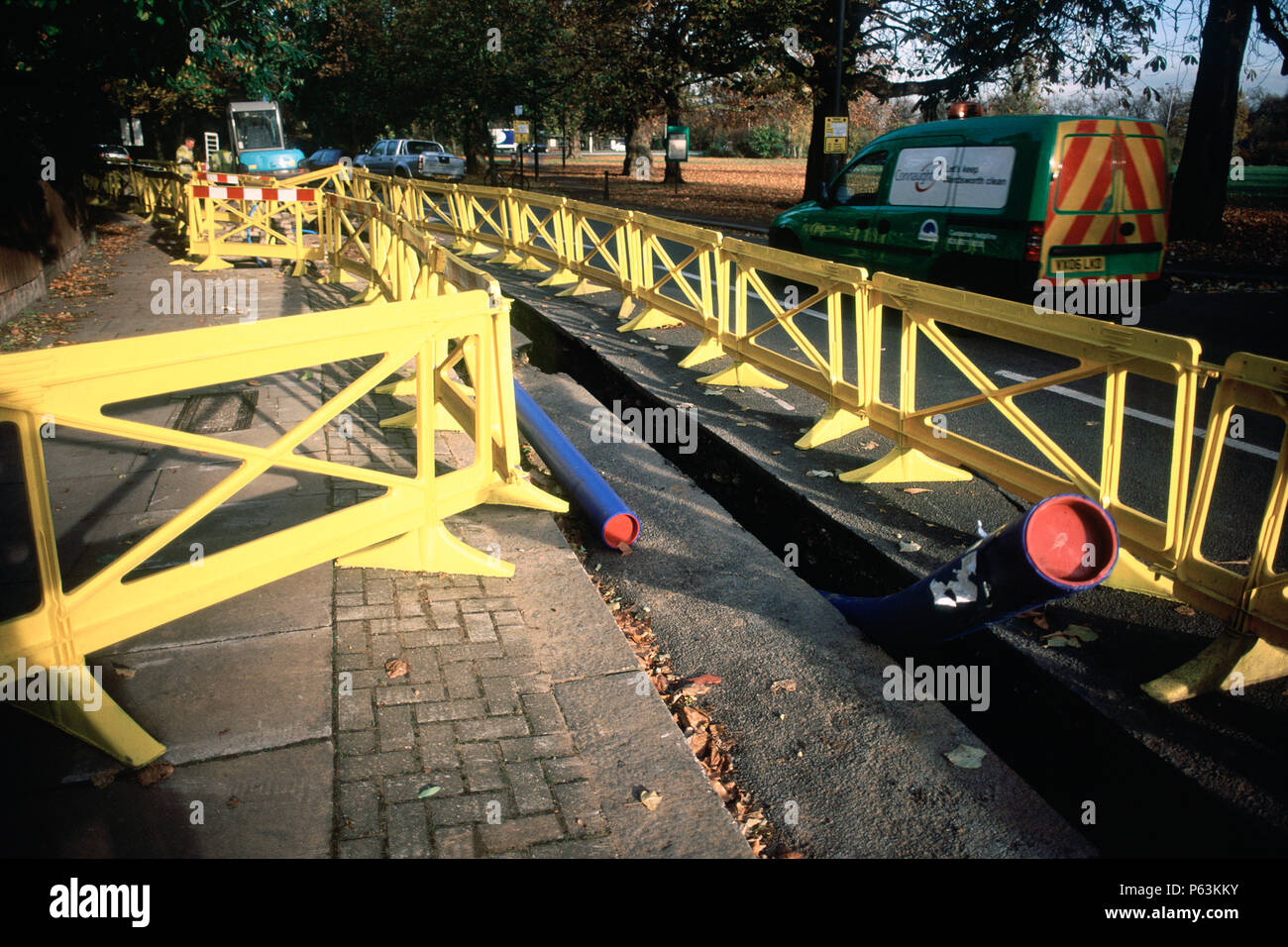 Plastic safety barrier around a trench for water pipe laying for