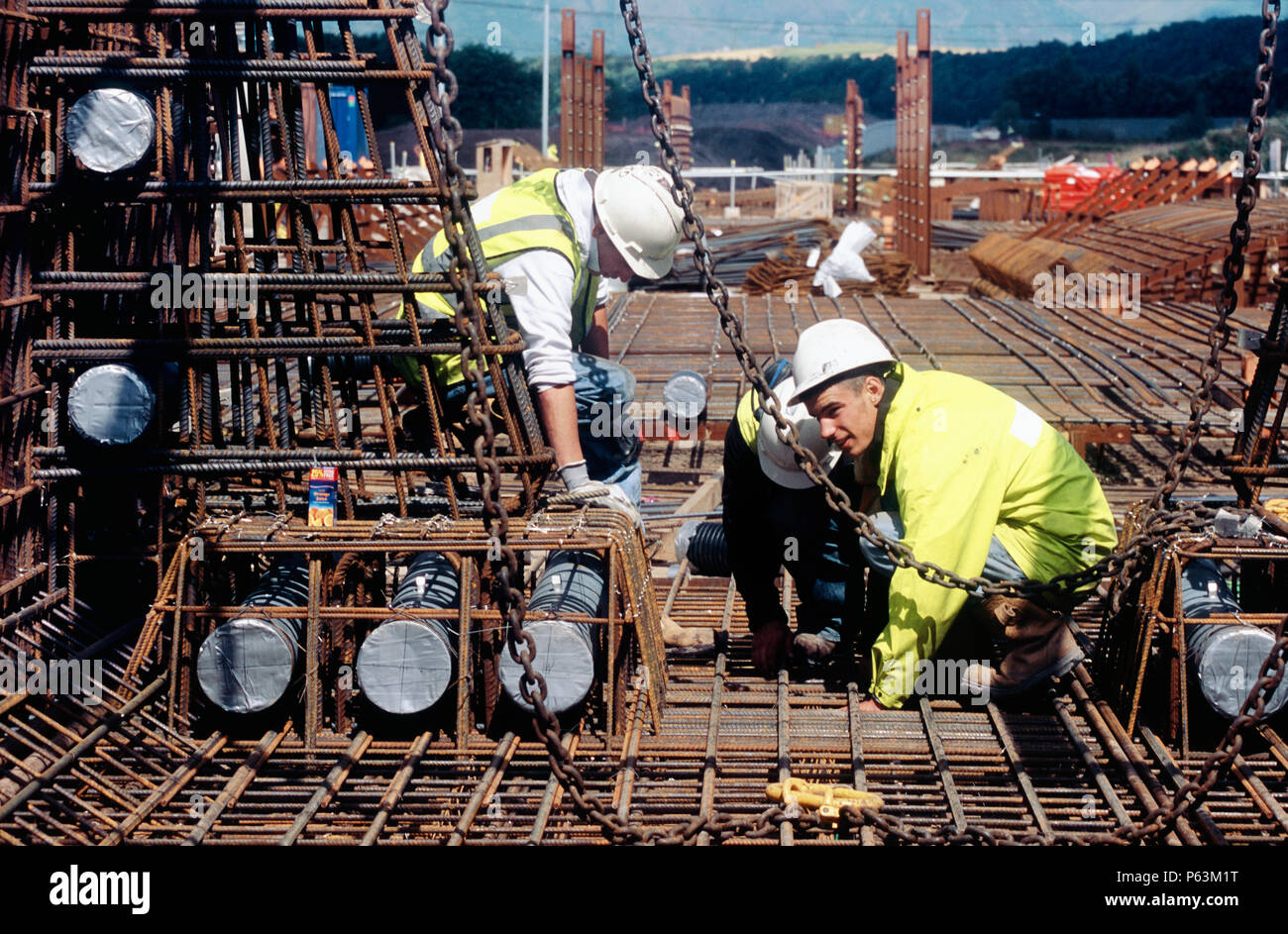 Adjusting reinforcement of the complex bridge pier top section cage, Upper Forth bridge Stock Photo