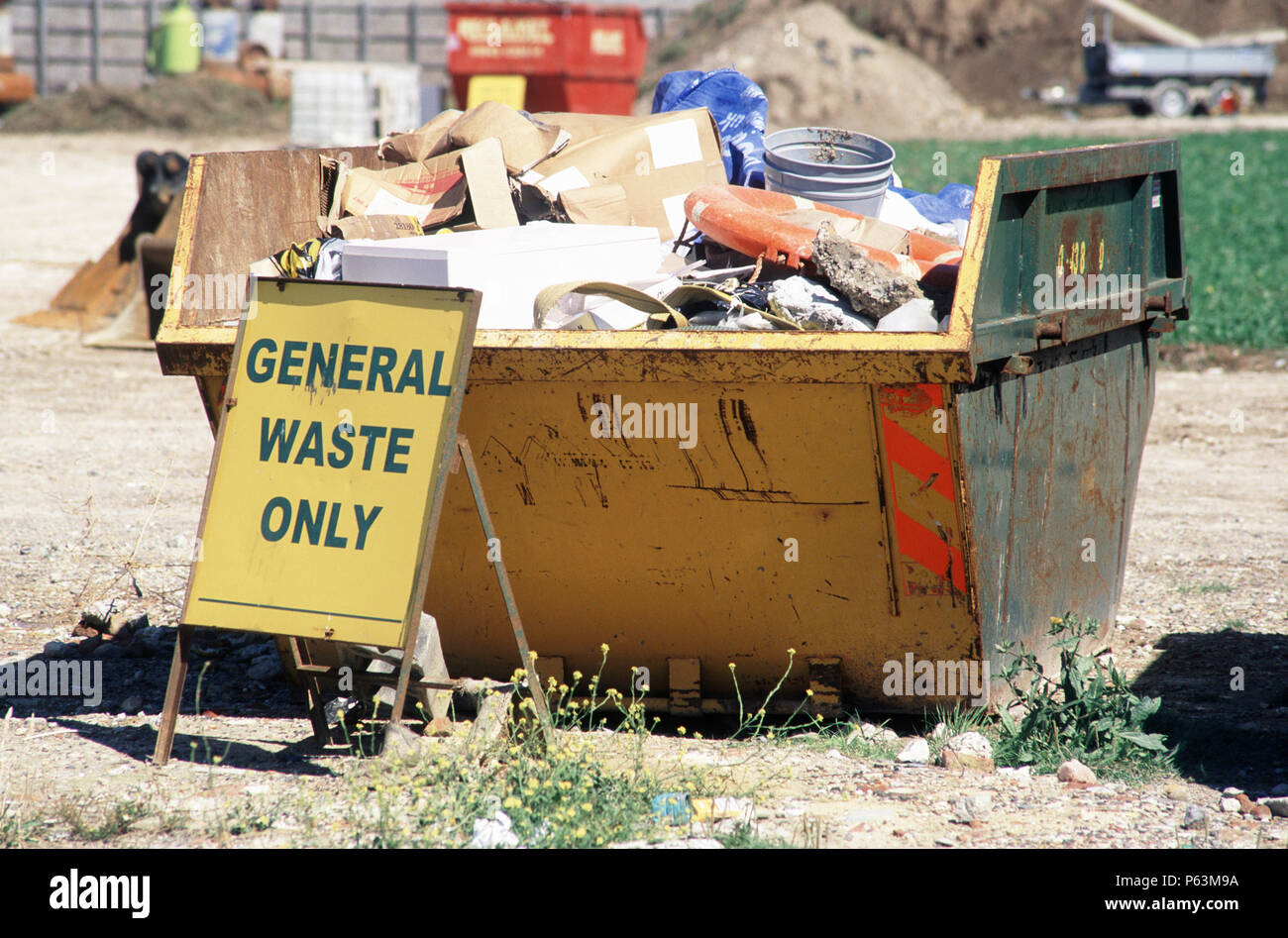 Waste skips on site with sorted types of waste Stock Photo Alamy